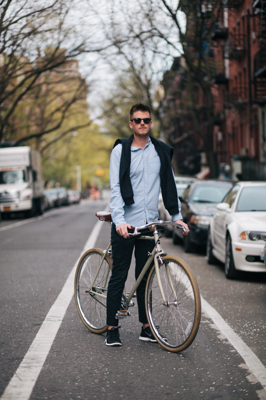 rides a Linus 3-speed bicycle  photographed on 9th St. and 2nd. Ave., Manhattan en route to meet a friend for coffee in the West Village