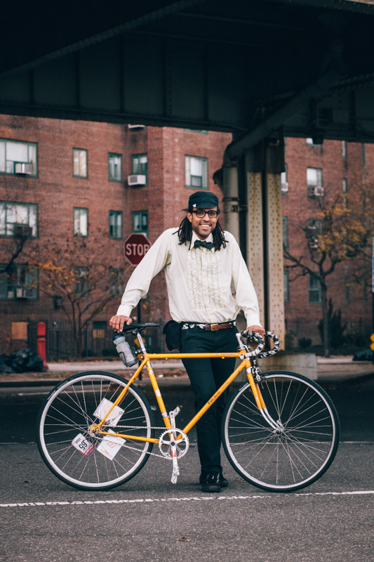 rides a '73 Panasonic fixed gear bicycle  photographed at the East River Bike Path and 23rd St., Manhattan  at this year's Cranksgiving charity ride