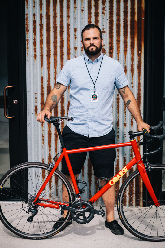 Billy with a Coarse Fabrications Aero 22-speed steel road bike  photographed at the Knockdown Center in Maspeth, Queens  while exhibiting at the Bike Cult Hand-Built Bike Show 