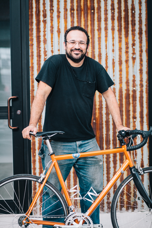 Lance  with a Squarebuilt 14-speed road bike  photographed at the Knockdown Center in Maspeth, Queens  while exhibiting at the Bike Cult Hand-Built Bike Show 