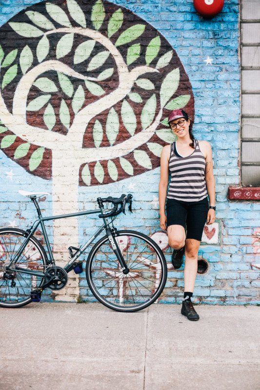 rides a Mars Cycles custom road bike photographed 5th St. and 46th Ave., outside Bike New York's Recycle-A-Bicycle warehouse in Long Island City for a profile in Bicycling Magazine